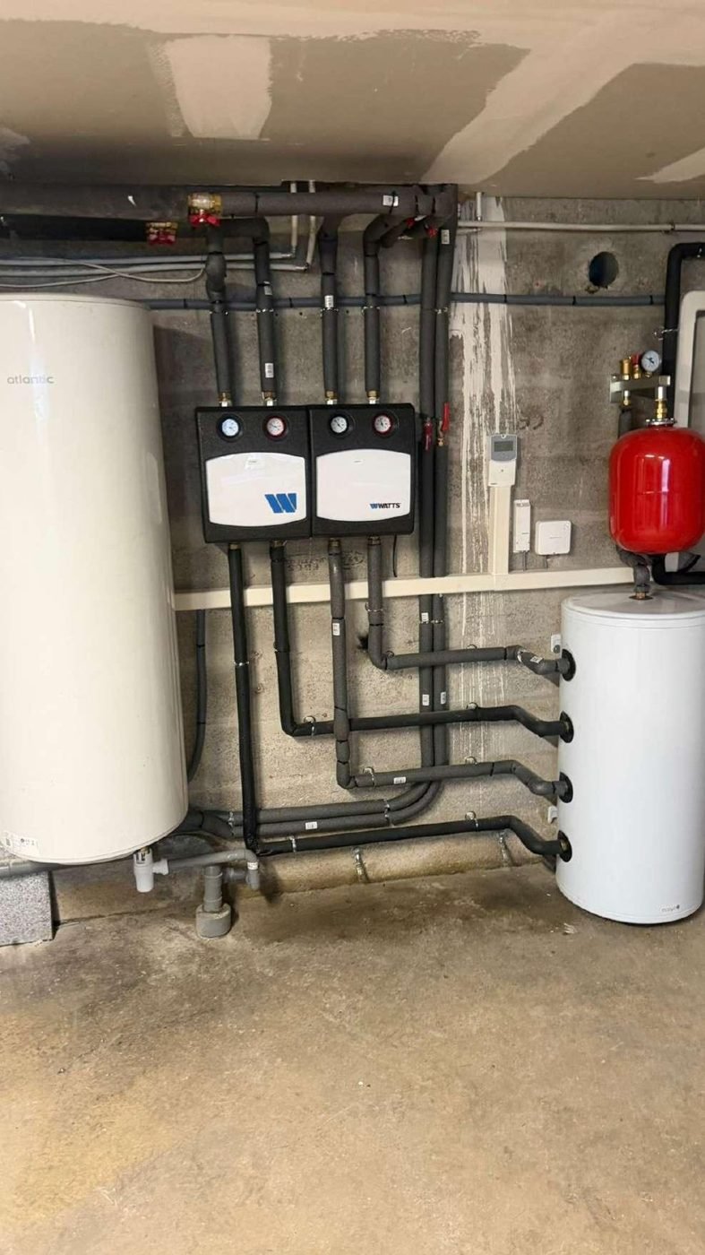 Chaufferie rénovée avec pompe à chaleur et ballon